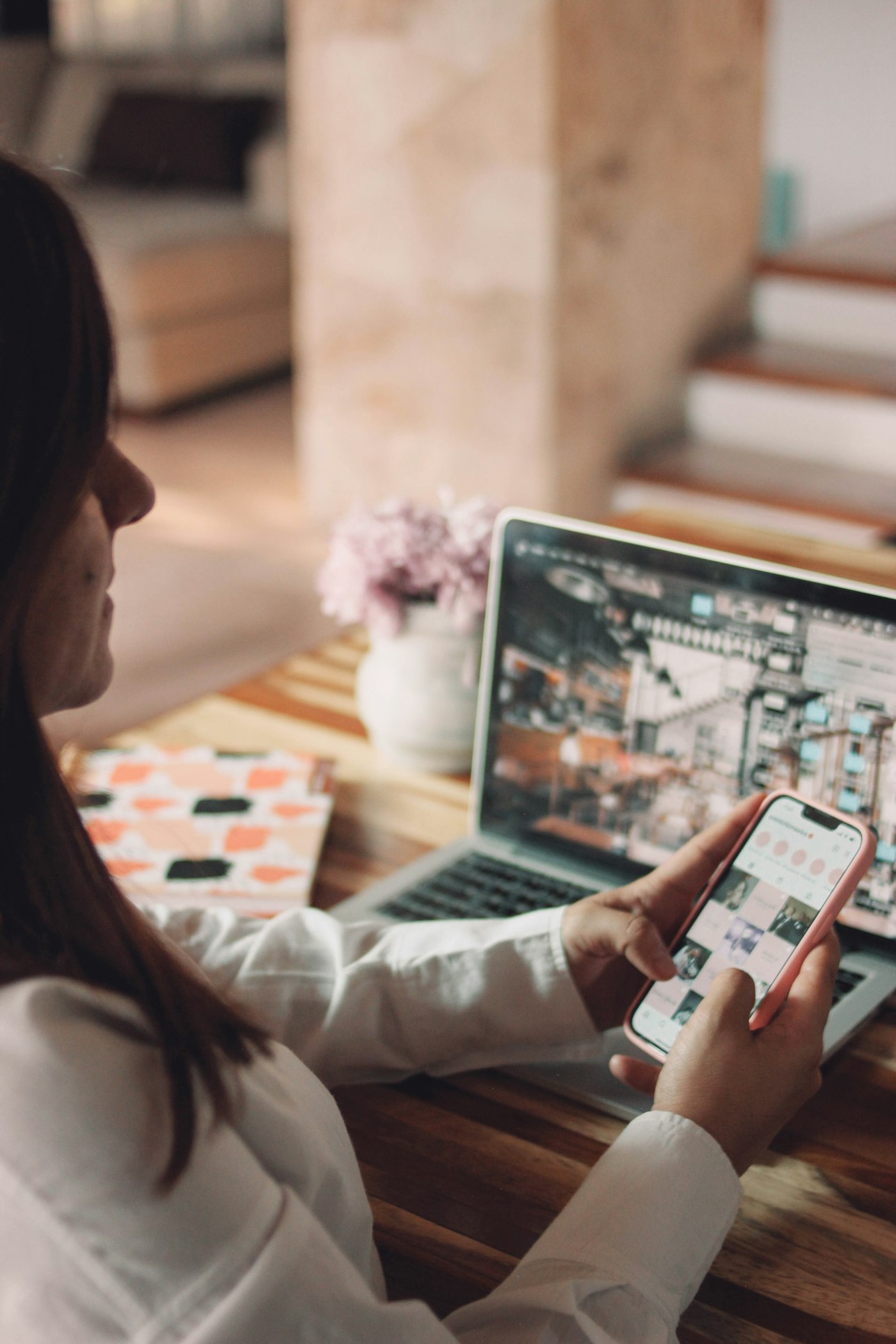 Wedding planner confirming guest attendance over the phone with notes