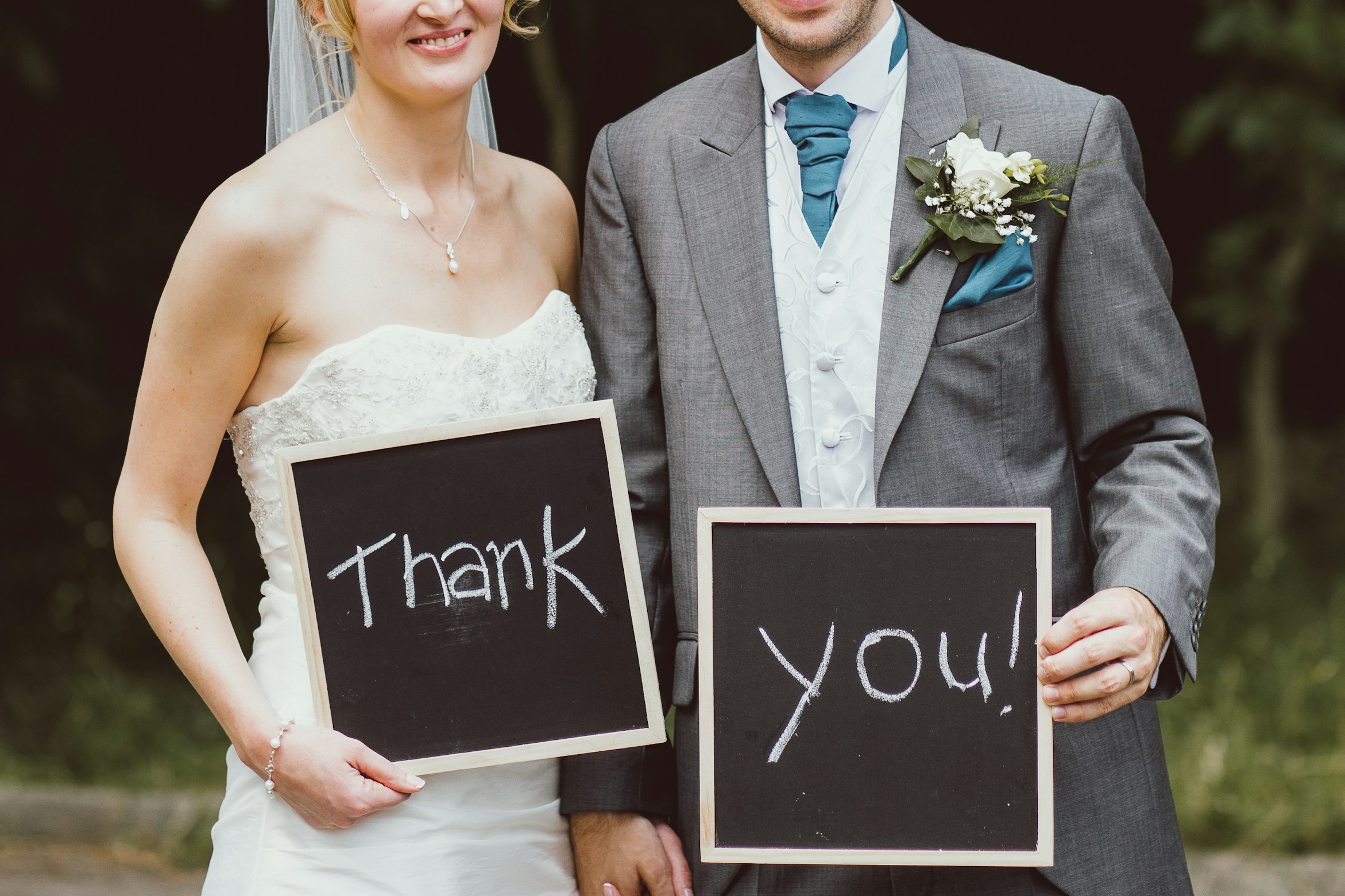 Stack of handwritten thank-you cards tied with ribbon